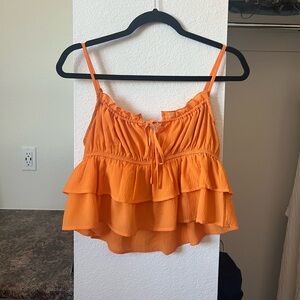 Orange flowy crop top